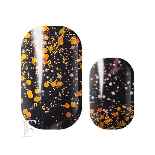 Flossé meteor black nail wraps with gold holographic sequins and glitter