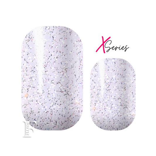 FLOSSé x series wide Crystal nail wraps. Soft lilac pearl base scattered with fine silver glitter. 
