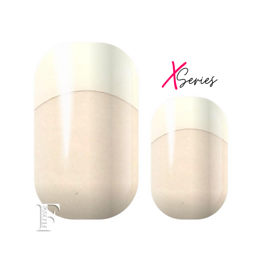 Flossé x series wide nail wraps French manicure. Clear base with white tips.