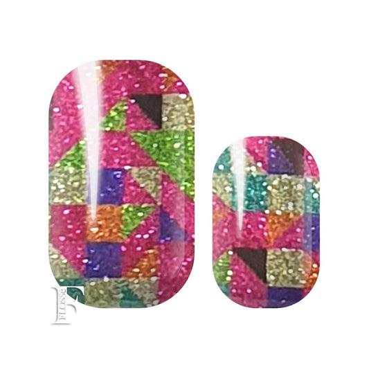 glitter nail wraps with squares of pink, green, blue, orange and silver