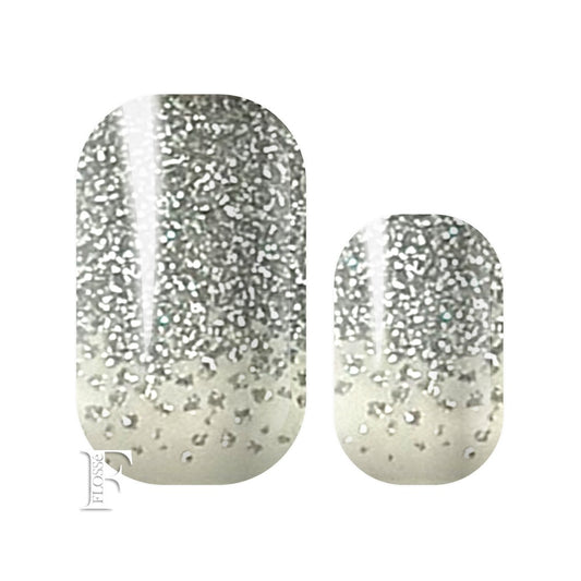 nail wraps with translucent base and silver glitter finger tips