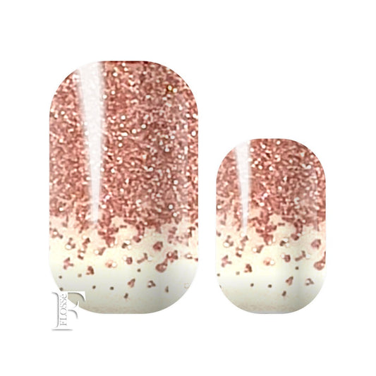 translucent nail wraps with solid pink glitter at the finger tips fading towards nail bed