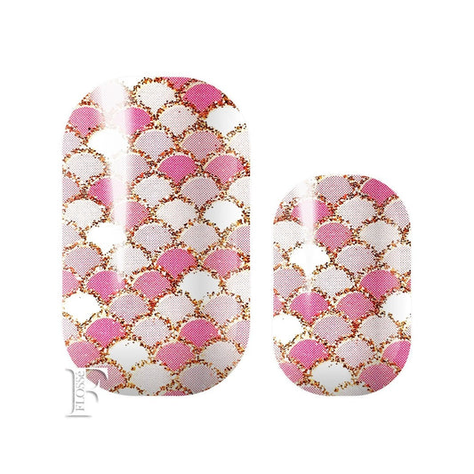 deco inspired fan pattern nail wraps in shades of pink and white with gold glitter details