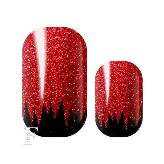 Fierce red glitter nail wraps with block black zig zags at the nail bed.