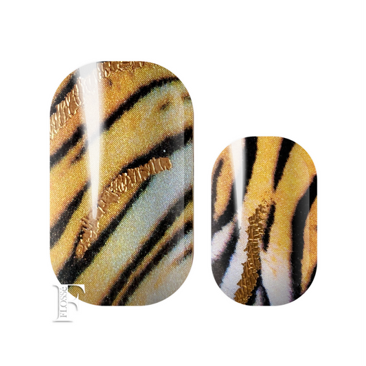 FLOSSé Tiger print gold foil nail wraps. 