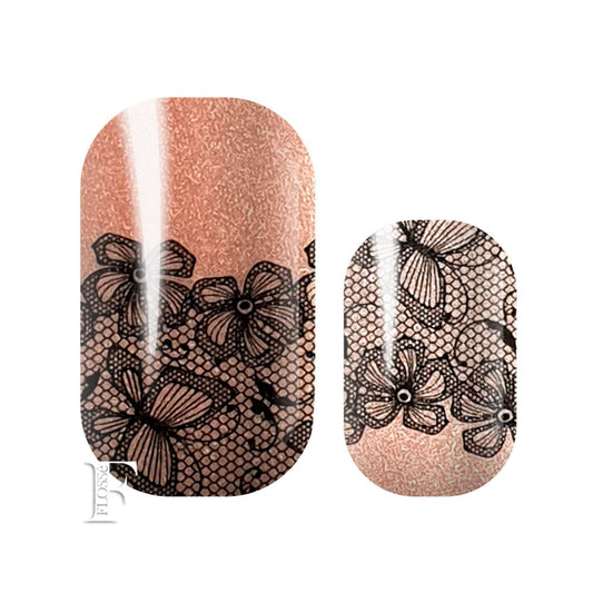 Peach coloured pearl styled nail wrap nail stickers. Overlaid with black lace featuring flowers and butterflies.