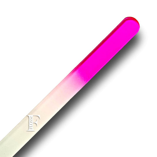 Pink Double sided crystal glass micro nail file that never goes blunt. Made with a finer grit compared to emery board files. making it more gentle on nails.  Simply wash clean under running water, and gently pat dry. 14cm x 1.2cm x .3cm