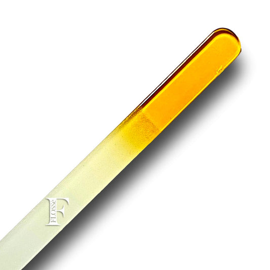 Yellow Double sided crystal glass micro nail file that never goes blunt. Made with a finer grit compared to emery board files. making it more gentle on nails.  Simply wash clean under running water, and gently pat dry. 14cm x 1.2cm x .3cm