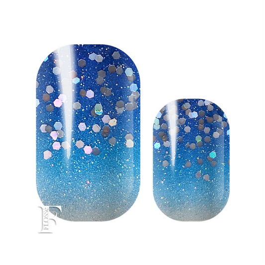 Pearl glitter ombre from white to deep arctic blue, finished with glitter and sequins. NZ nail wrap stickers. 