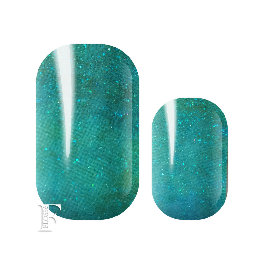 Flossé Tranquillity nail wraps deep lustourious pearl green glitter wrap. 