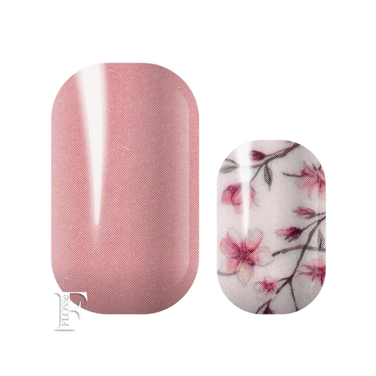 Alternating nail wrap set with glossy light pink block coloured nails, and Cherry blossom floral branch pattern with a light soft almost white background on accent nails. New Zealand nail wrap stickers. 