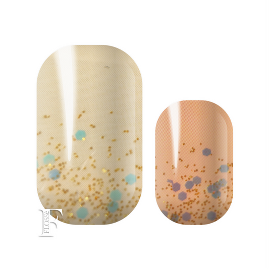 Flossé autumn mist nail wraps. Mixed set of 16 wraps in creams and peaches. Finished with gold glitter and sequins. 
