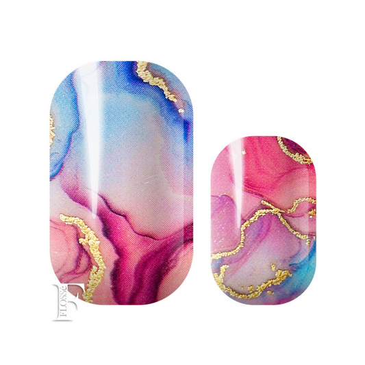 Flossé glazed marble nail wraps. Semi transparent marbled pinks and blues finished with gold foil details