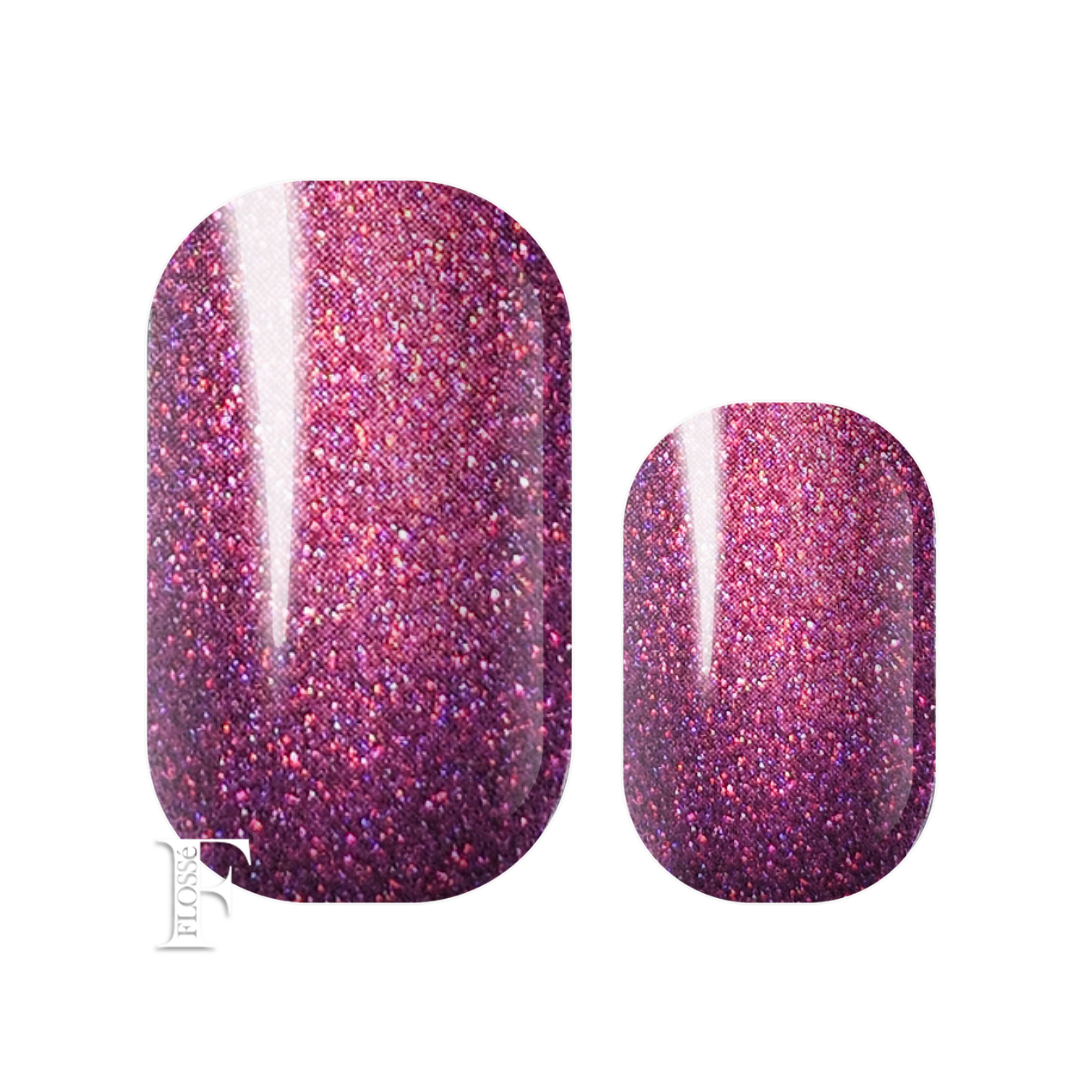 Flossé nail wraps featuring an ombre of deep burgundy around the nail edge fading to a stunning pink at the centre of the nail. Shimmering pearl finish. New Zealand nail wraps. 