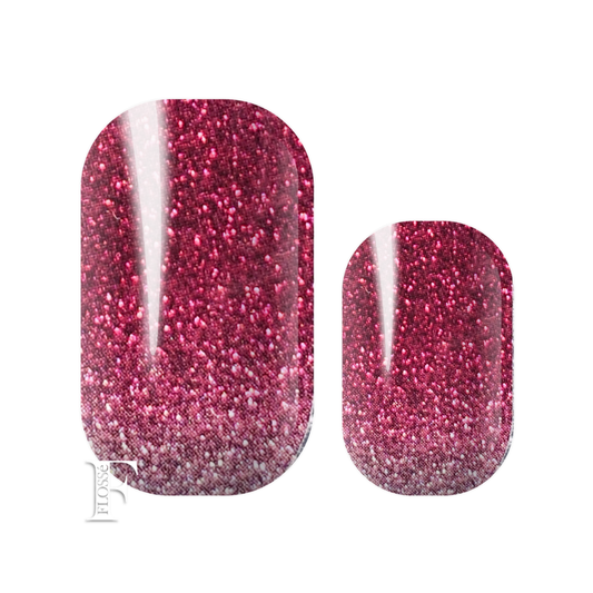 Flossé nail wraps featuring a soft ombre of glittering guava red tones. New Zealand nail wrap stickers. 