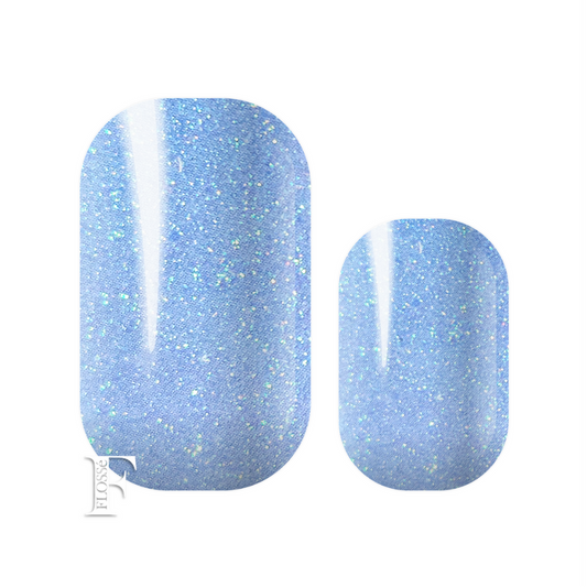 Flossé forget me not blue nail wraps. Pale blue pearl wraps with a fine irredescent glitter. 