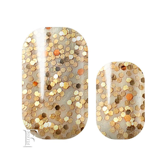 translucent nail wrap with gold and bronze sequin glitter