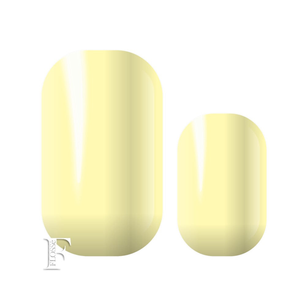 Soft buttery yellow flossé nail wraps.