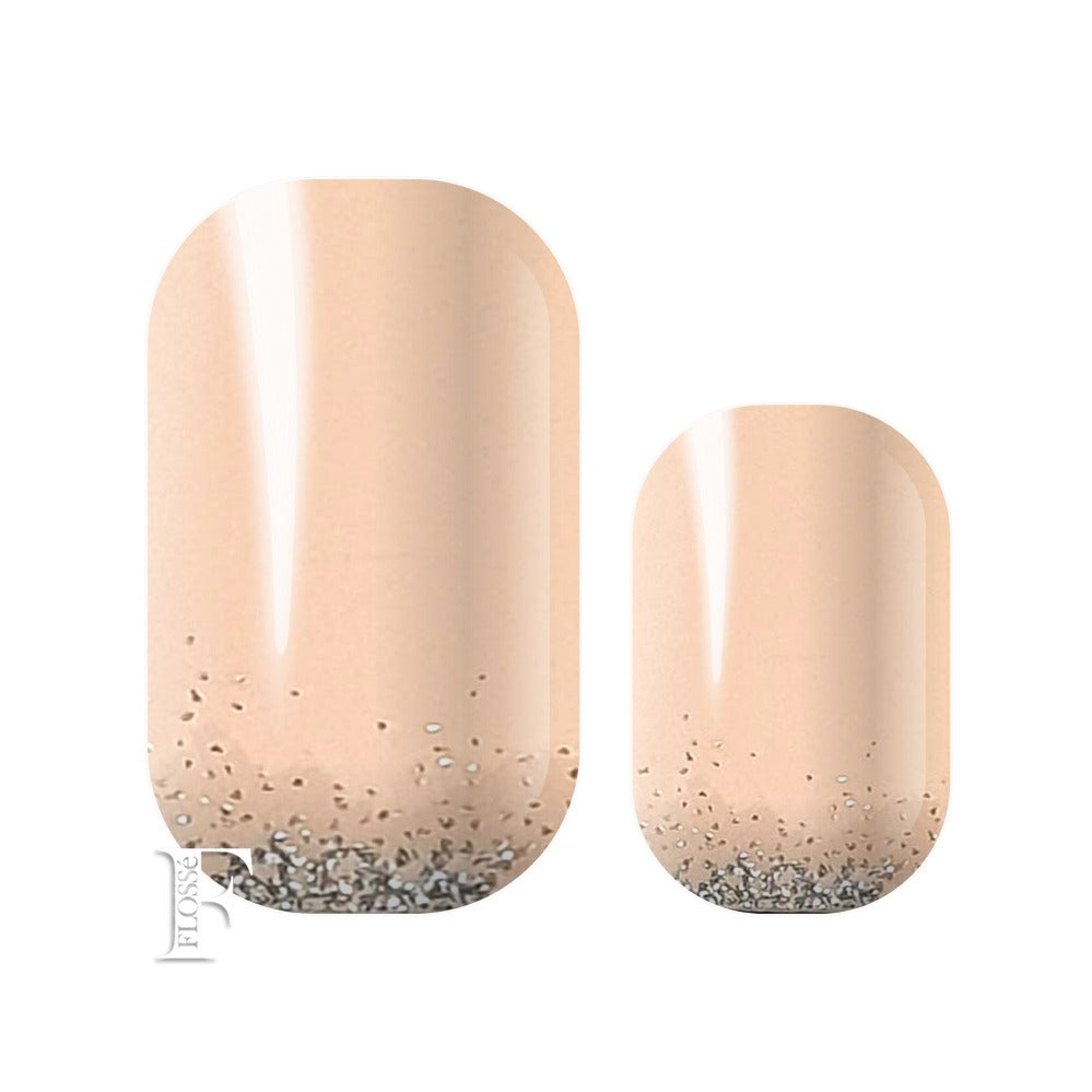Soft pink nail wraps with subtle touch of silver glitter at the nail base. Nail polish stickers.
