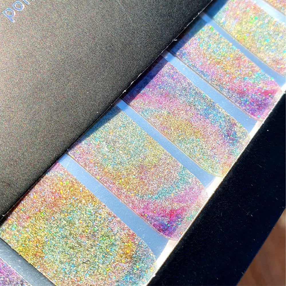 Close up of Unicorn Dust nail wraps holographic shimmer.