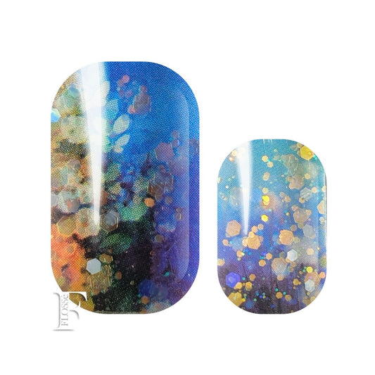 Blue Lagoon FLOSSé nail wraps with colours and shimmers just like a lagoon. blues, greens and sandy colours, topped with gold sequins and glitter.