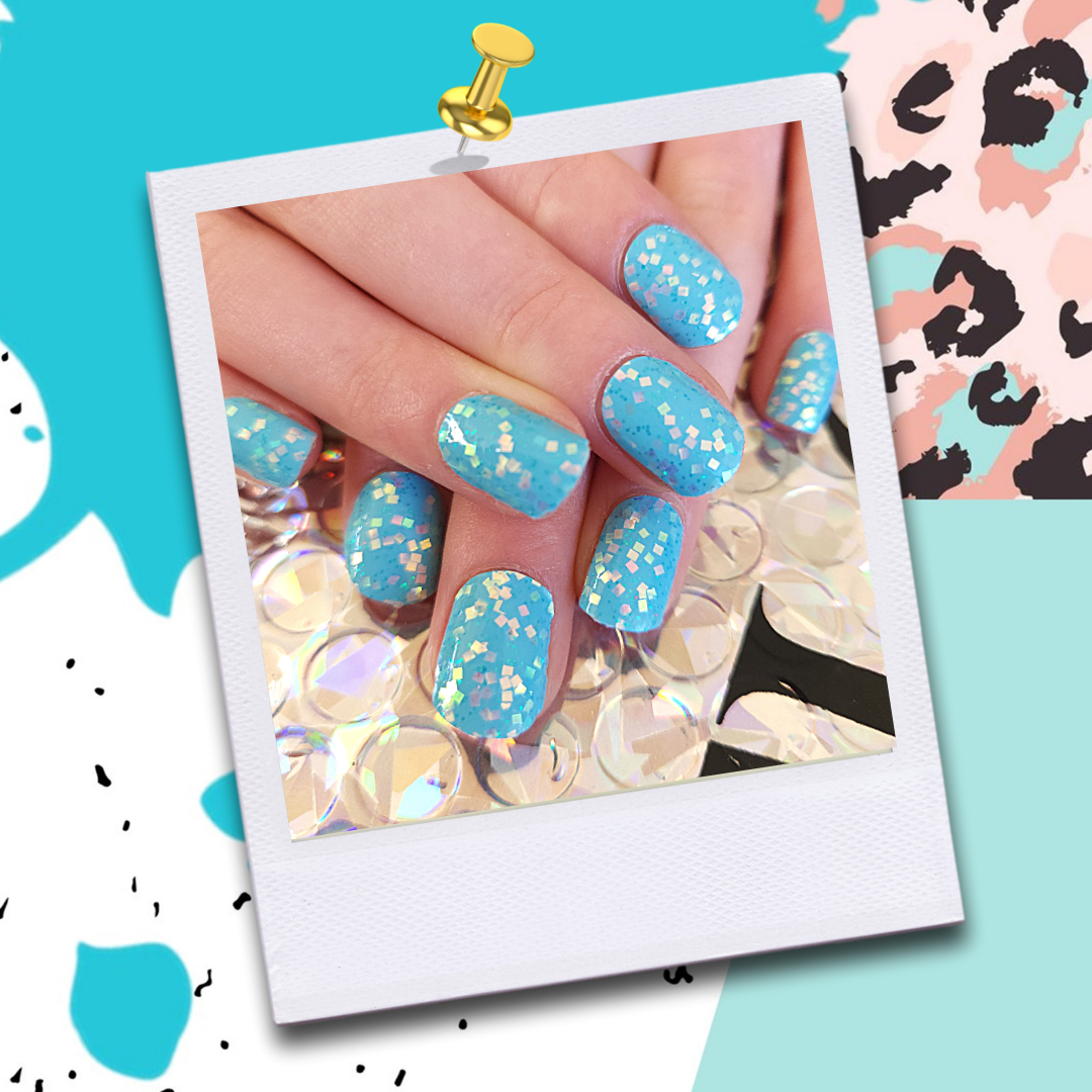 Manicured hands with FLOSSé Topaz nail wraps. Bright turquoise base with luminescent sequins and glitter. 