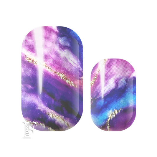 Bright mixed purples  pinks and blue, blended together with gold foil accents. FLOSSé Lavender Dream nail wraps