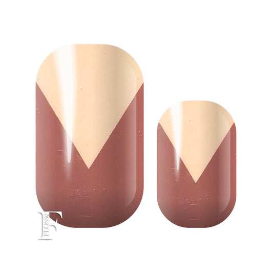 Blush coloured nail wrap with v shape cut out in pink.