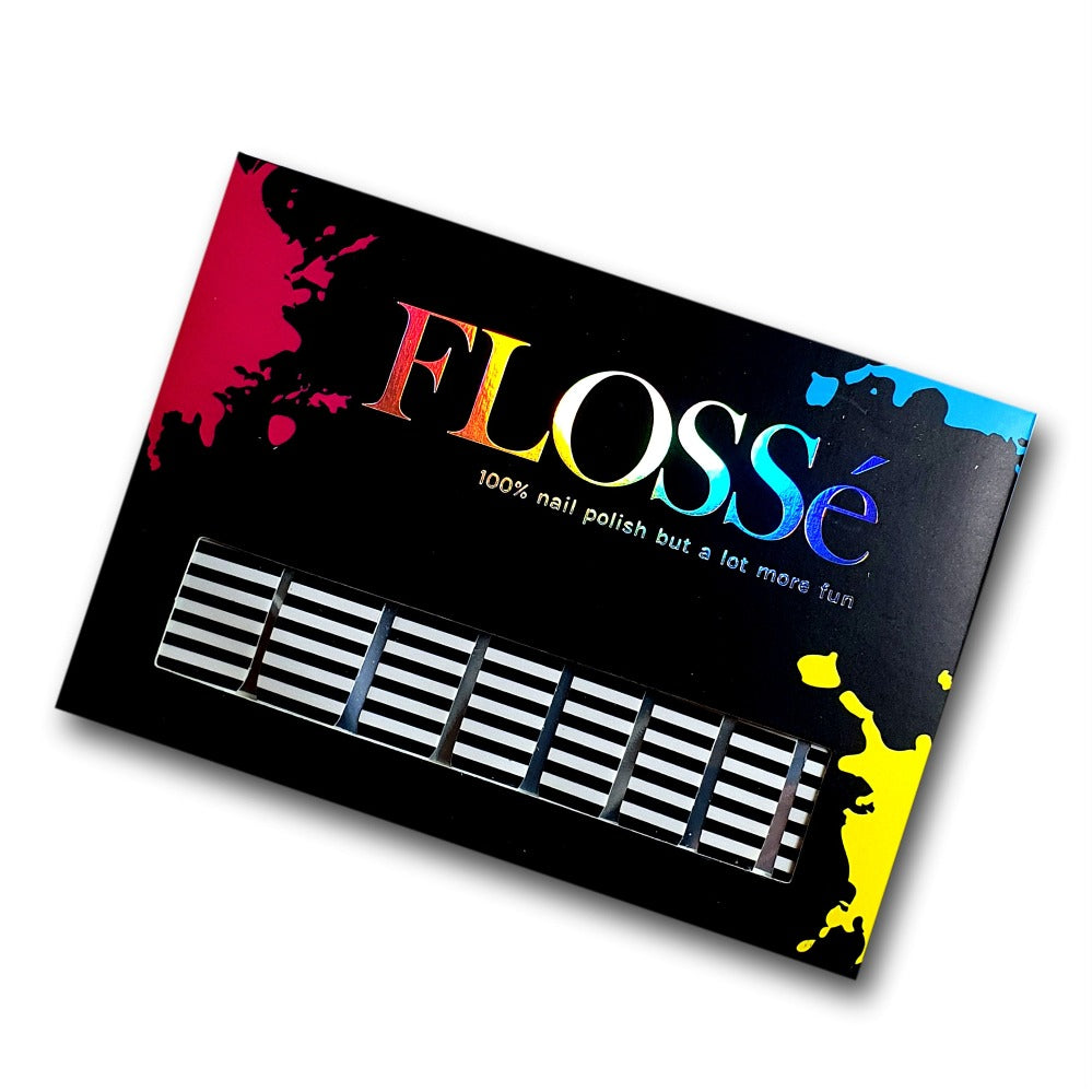 Black and white stripe nail wraps shown in FLOSSé boxed packaging. Long lasting instant nail polish