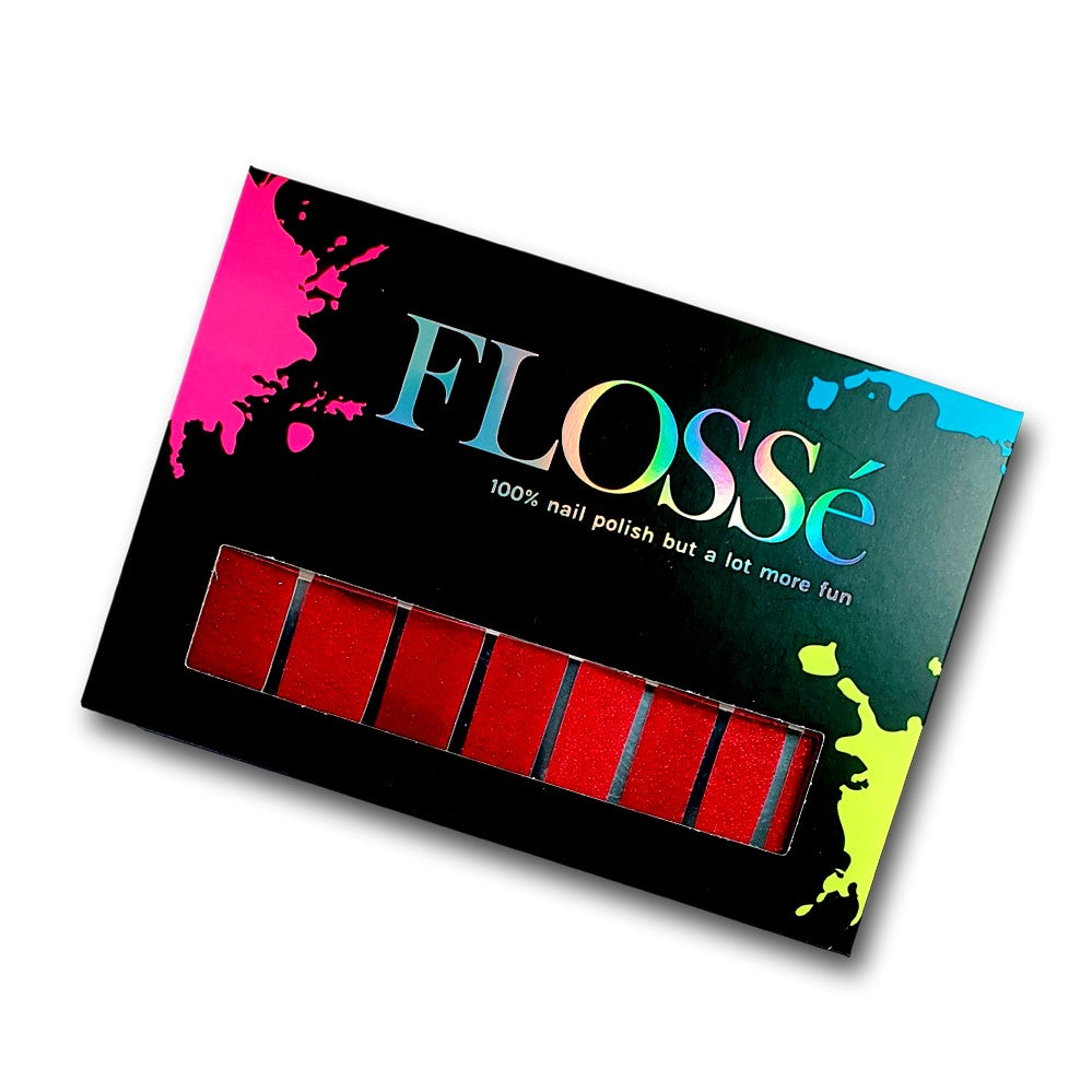 Dorothy style red glitter nail wraps in FLOSSe packaging.