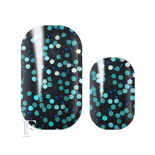 Deep dark nail wraps with vivid green sequins and blue glitter.