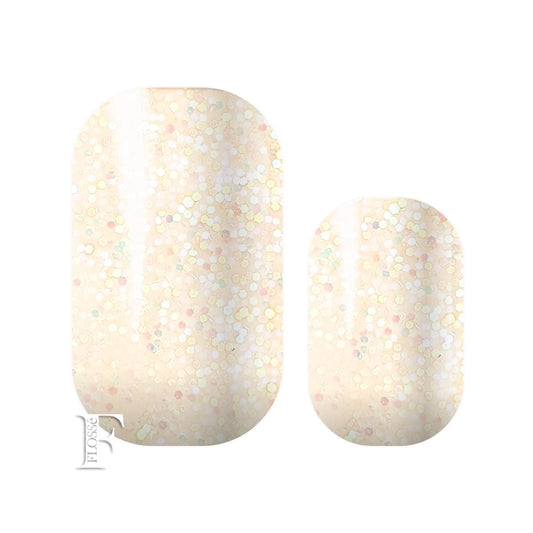 White glitter nail wraps that reflect holographic colours in the light.
