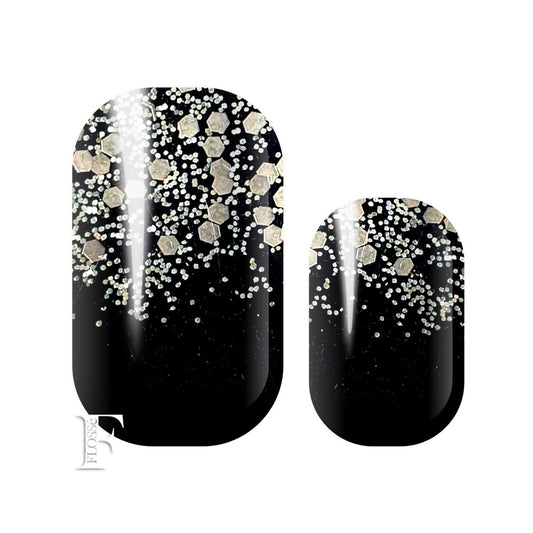 Pewter Poison FLOSSé nail wraps solid black gloss base with pewter silver coloured glitter and sequins overlaid in ombre style towards nail tip.
