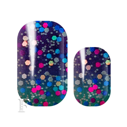 nail wraps with deep purple base with subtle ombré to teal green at the nail base. Covered in silver glitter, purple, teal and silver sequins.